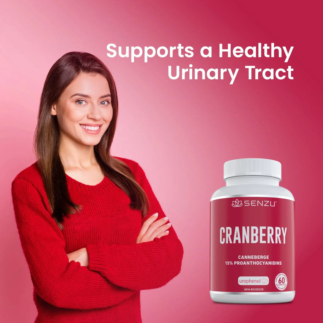 A smiling woman in a red sweater stands with arms crossed next to a bottle of Senzu Health Cranberry Extract Urophenol. The text above reads: Supports Urinary Tract Health and UTI Prevention. Pink gradient background.